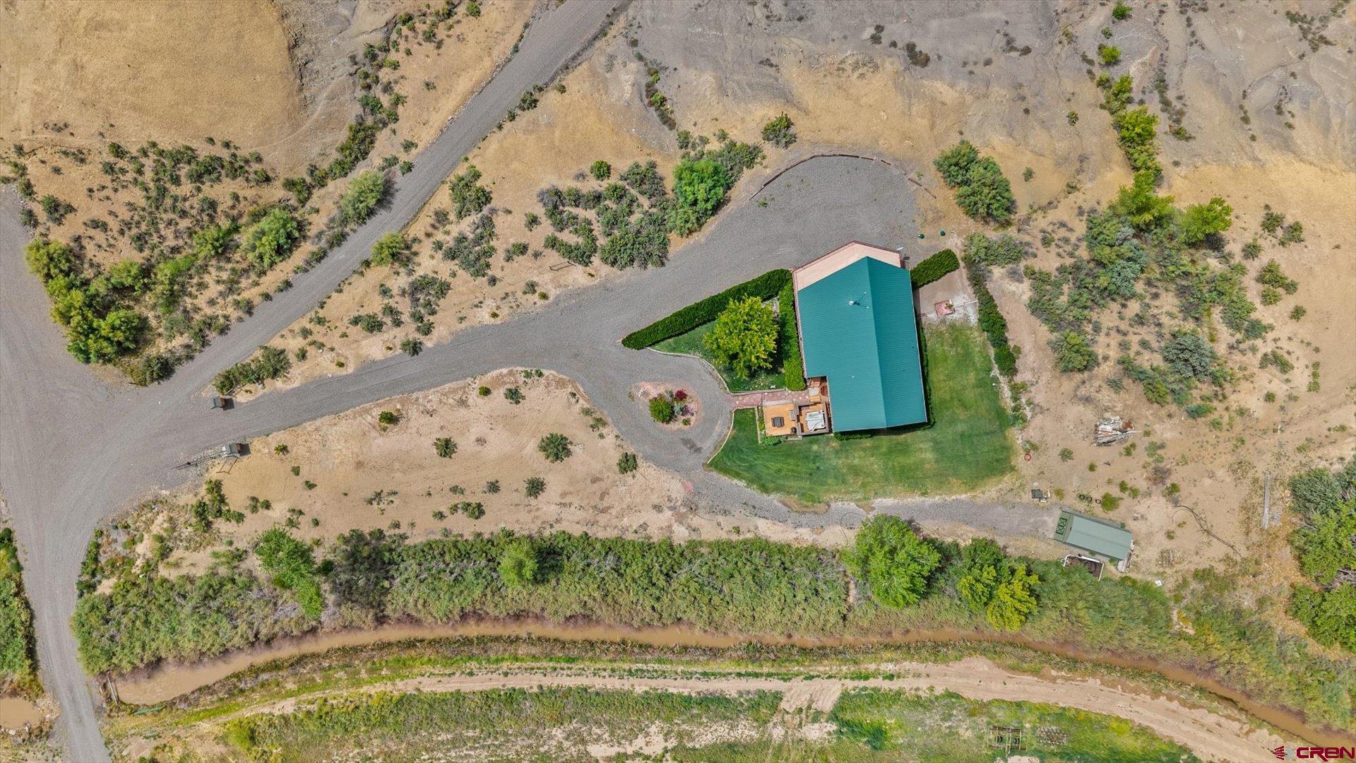 13232 B Road Delta, CO 81416 - Photo 19 of 26 a view of houses with a yard
