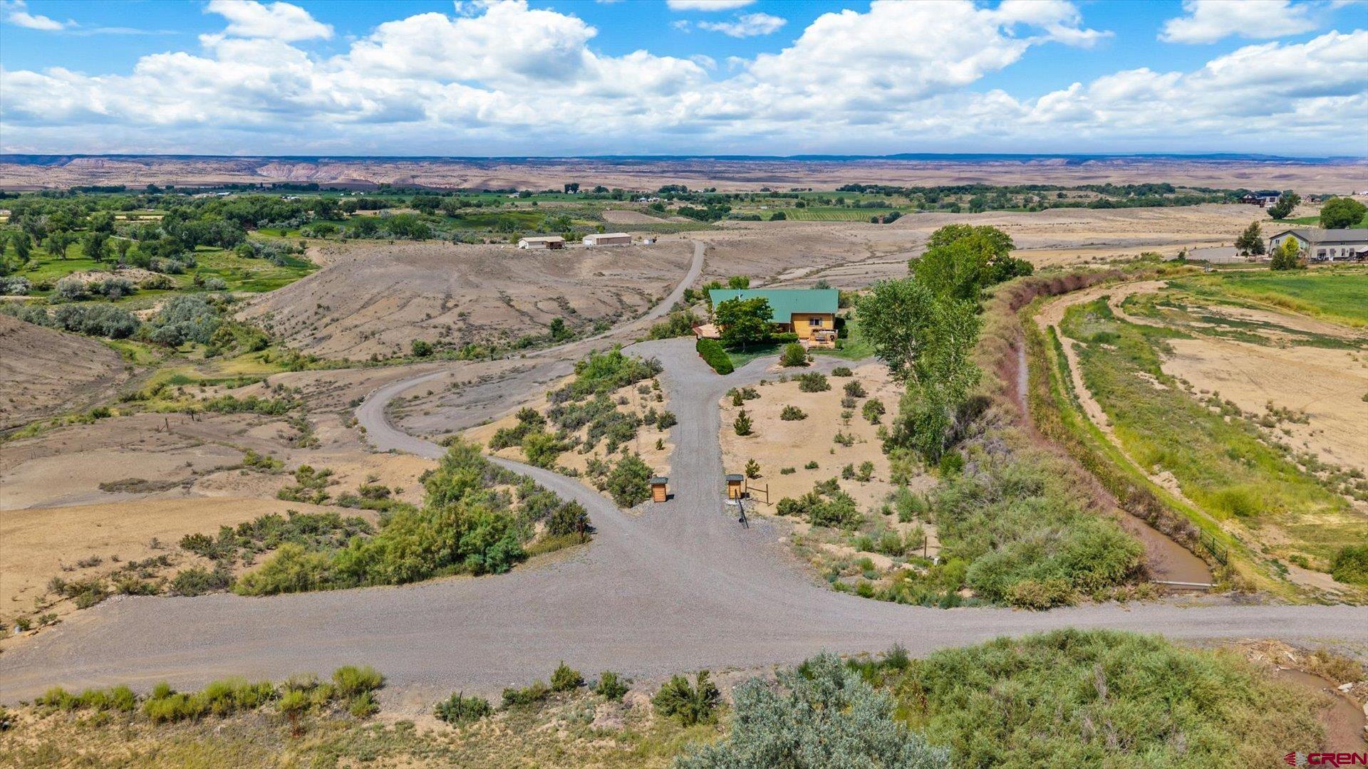 13232 B Road Delta, CO 81416 - Photo 22 of 26 a view of a lake with a mountain