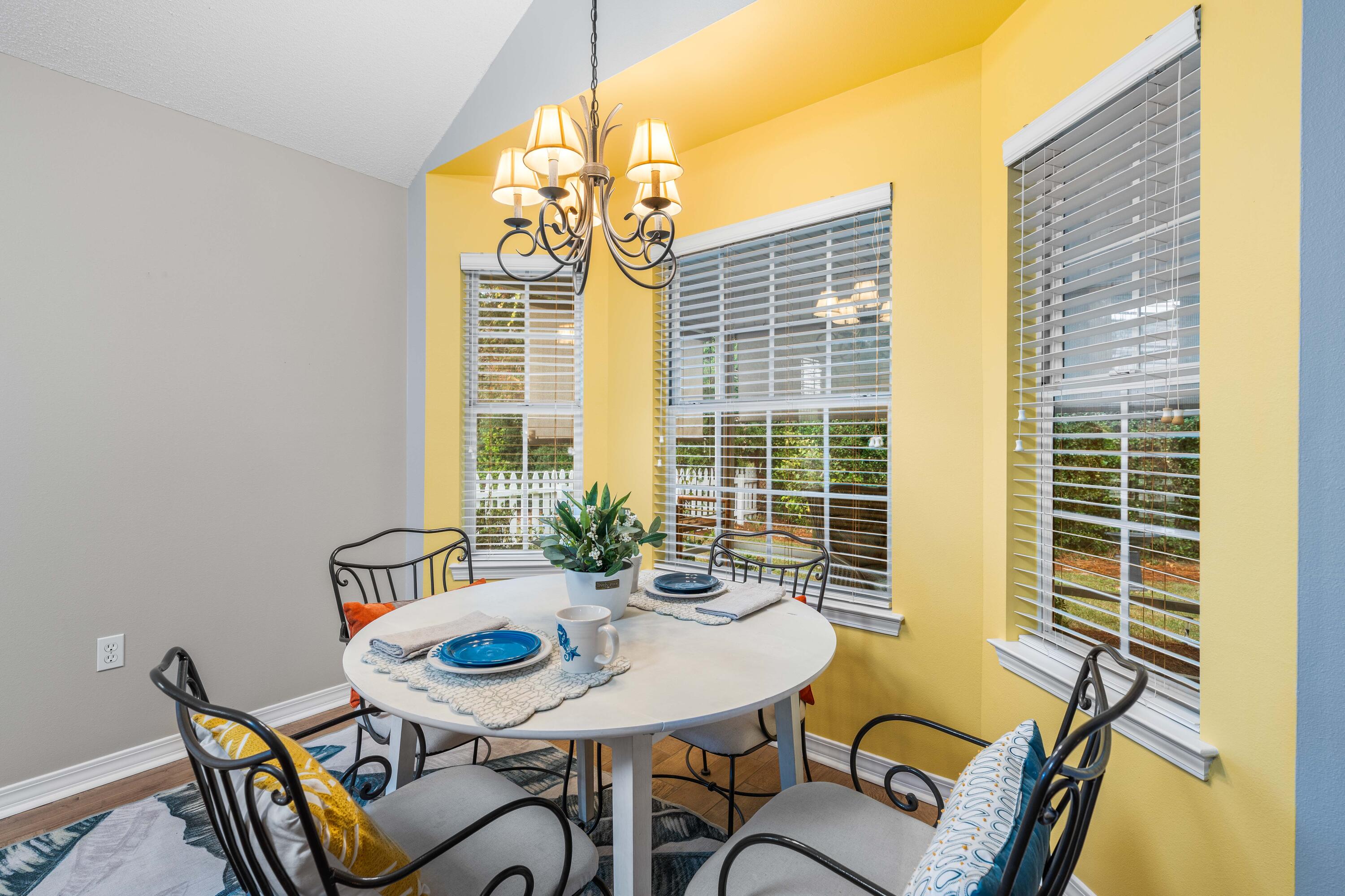 328 Bay Tree Drive Miramar Beach, FL 32550 - Photo 17 of 49 a view of a dining room with furniture and window