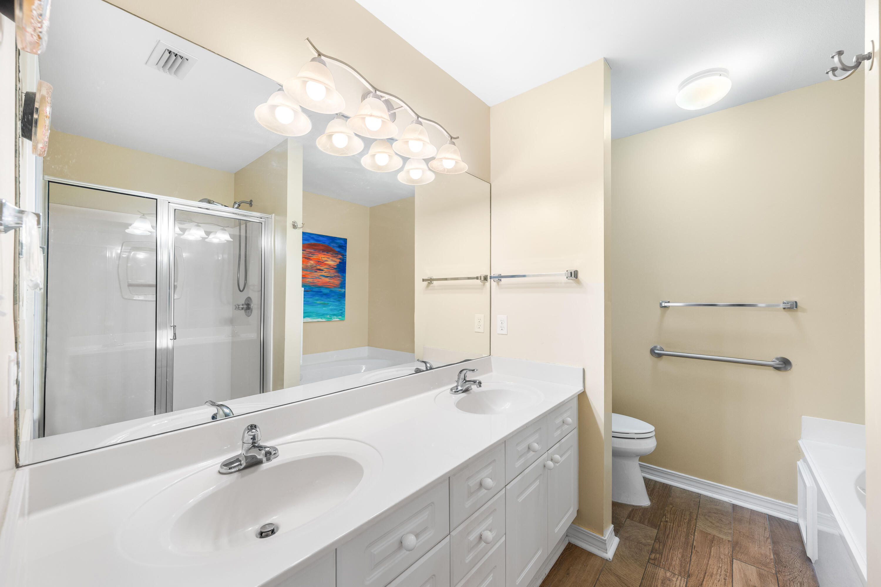 328 Bay Tree Drive Miramar Beach, FL 32550 - Photo 25 of 49 a bathroom with a double vanity sink mirror and toilet