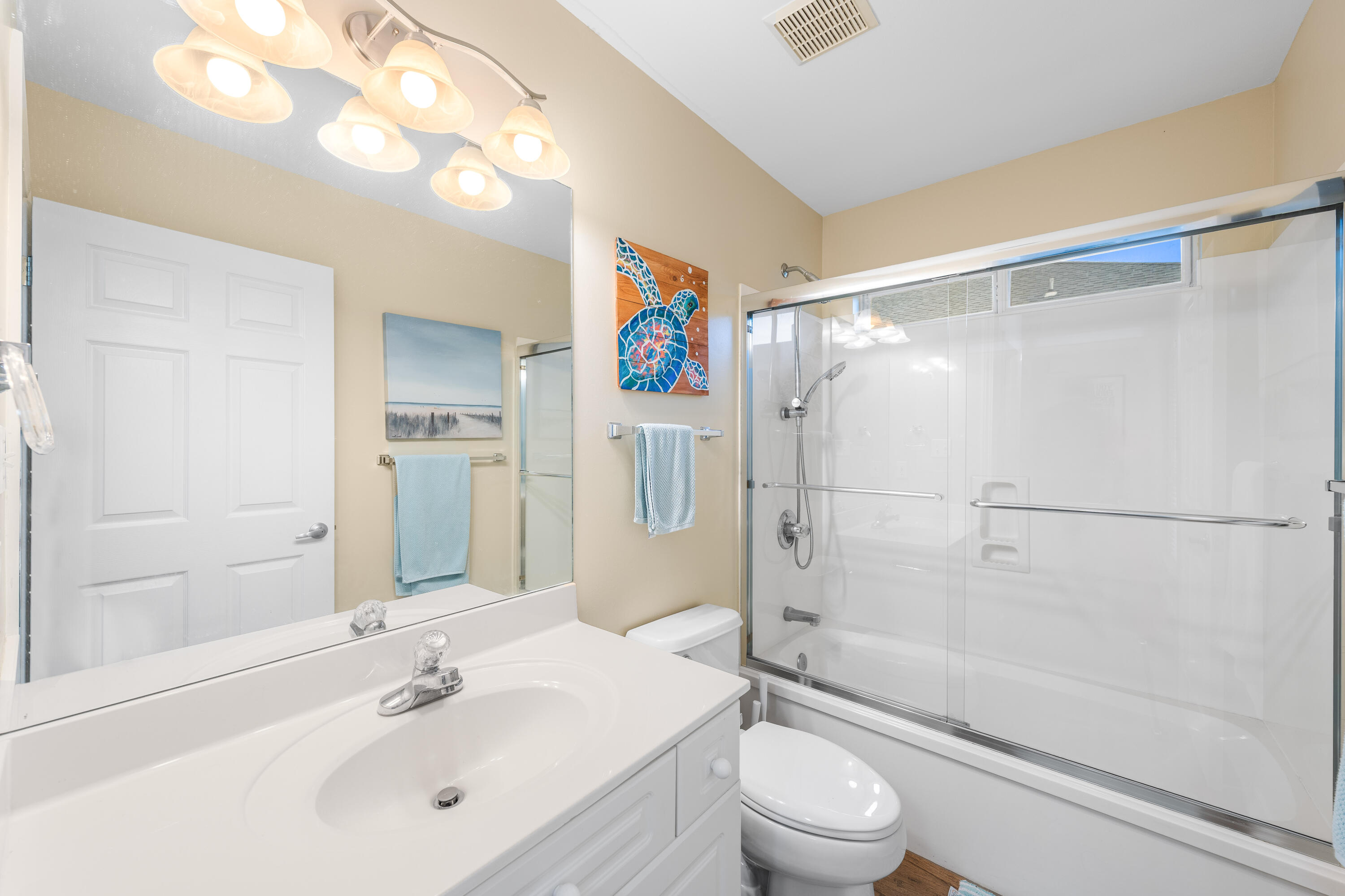 328 Bay Tree Drive Miramar Beach, FL 32550 - Photo 30 of 49 a bathroom with a sink a toilet and a large mirror