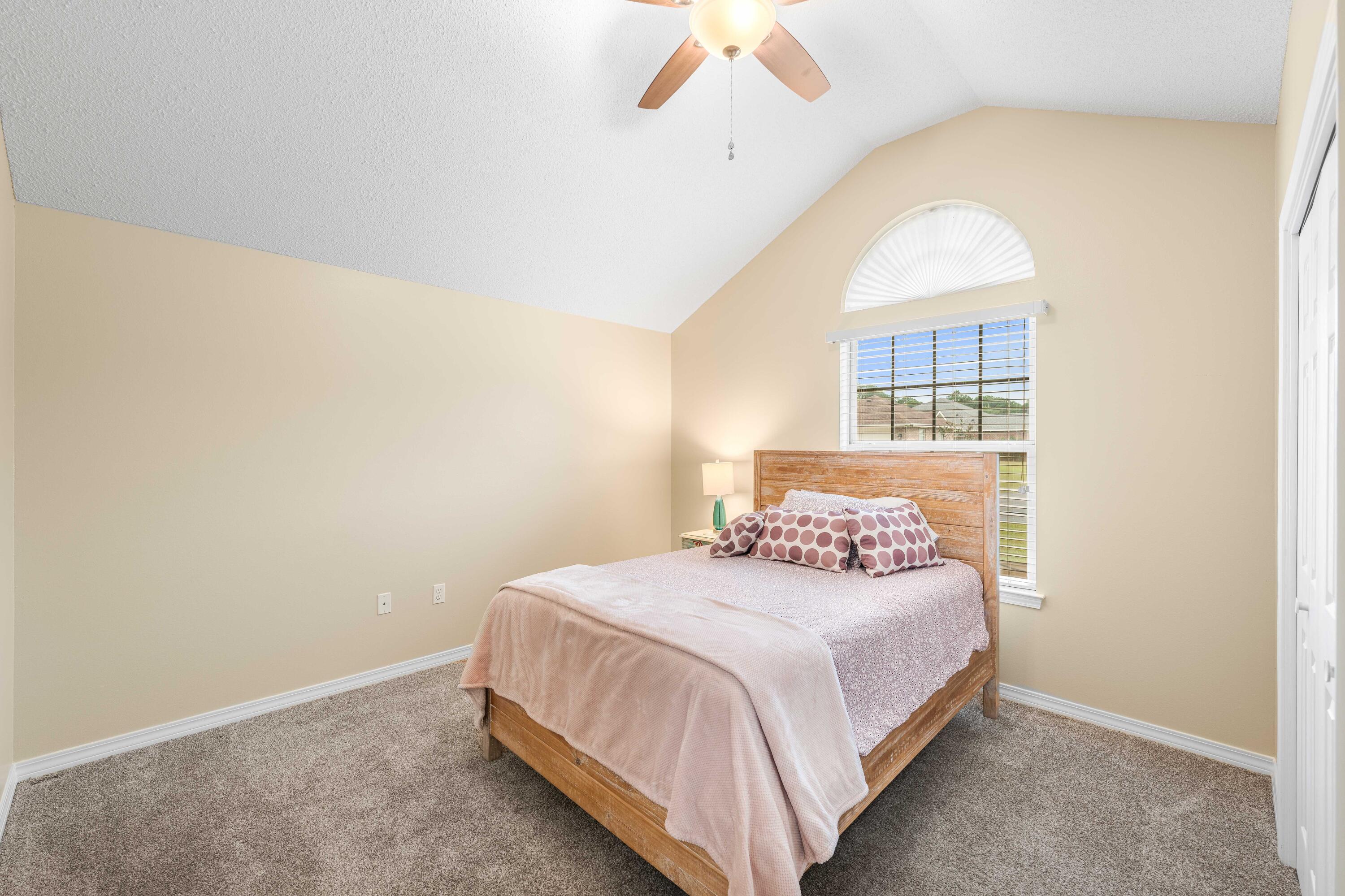 328 Bay Tree Drive Miramar Beach, FL 32550 - Photo 31 of 49 a bedroom with a bed and a window