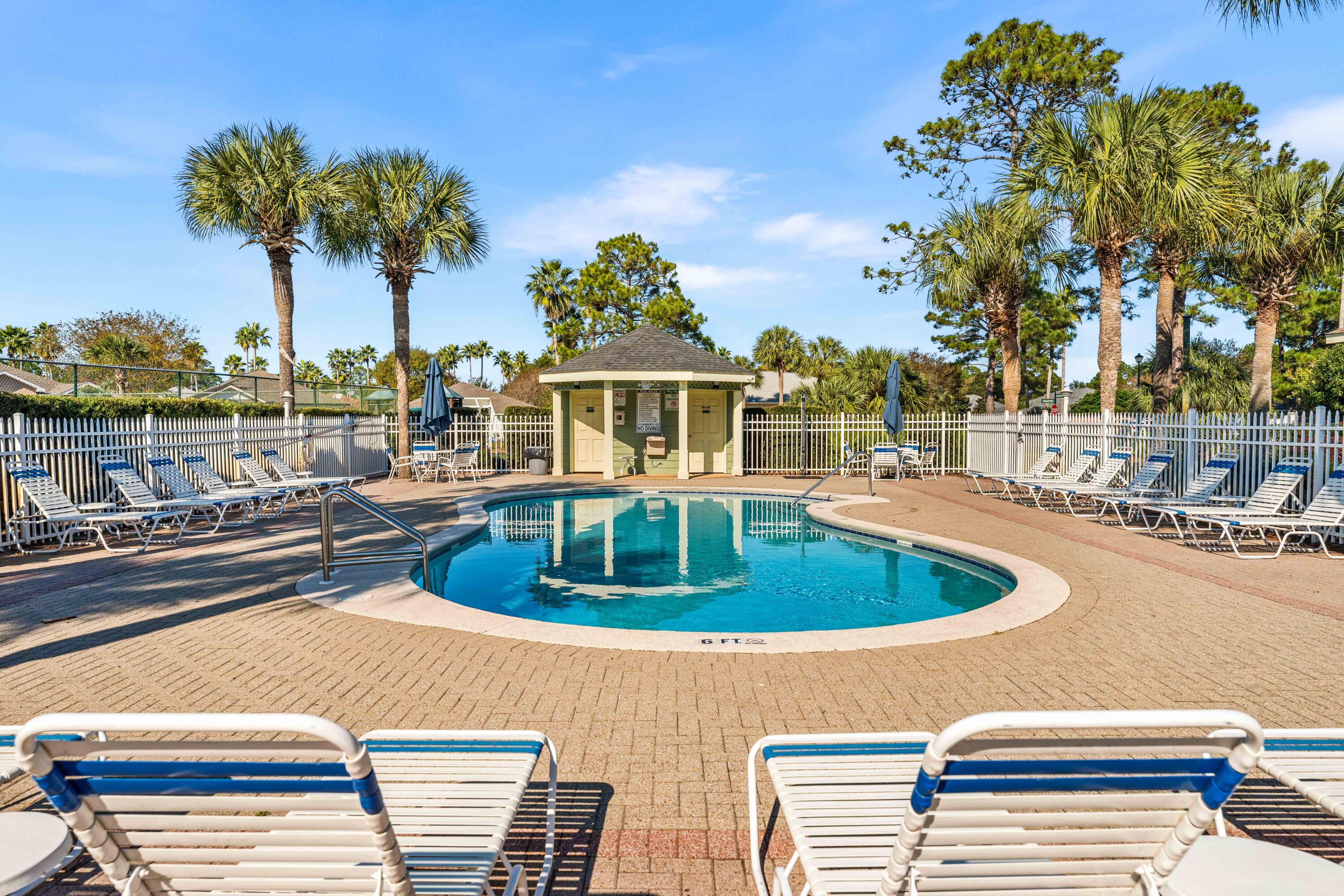 328 Bay Tree Drive Miramar Beach, FL 32550 - Photo 43 of 49 a house view with a swimming pool and sitting space