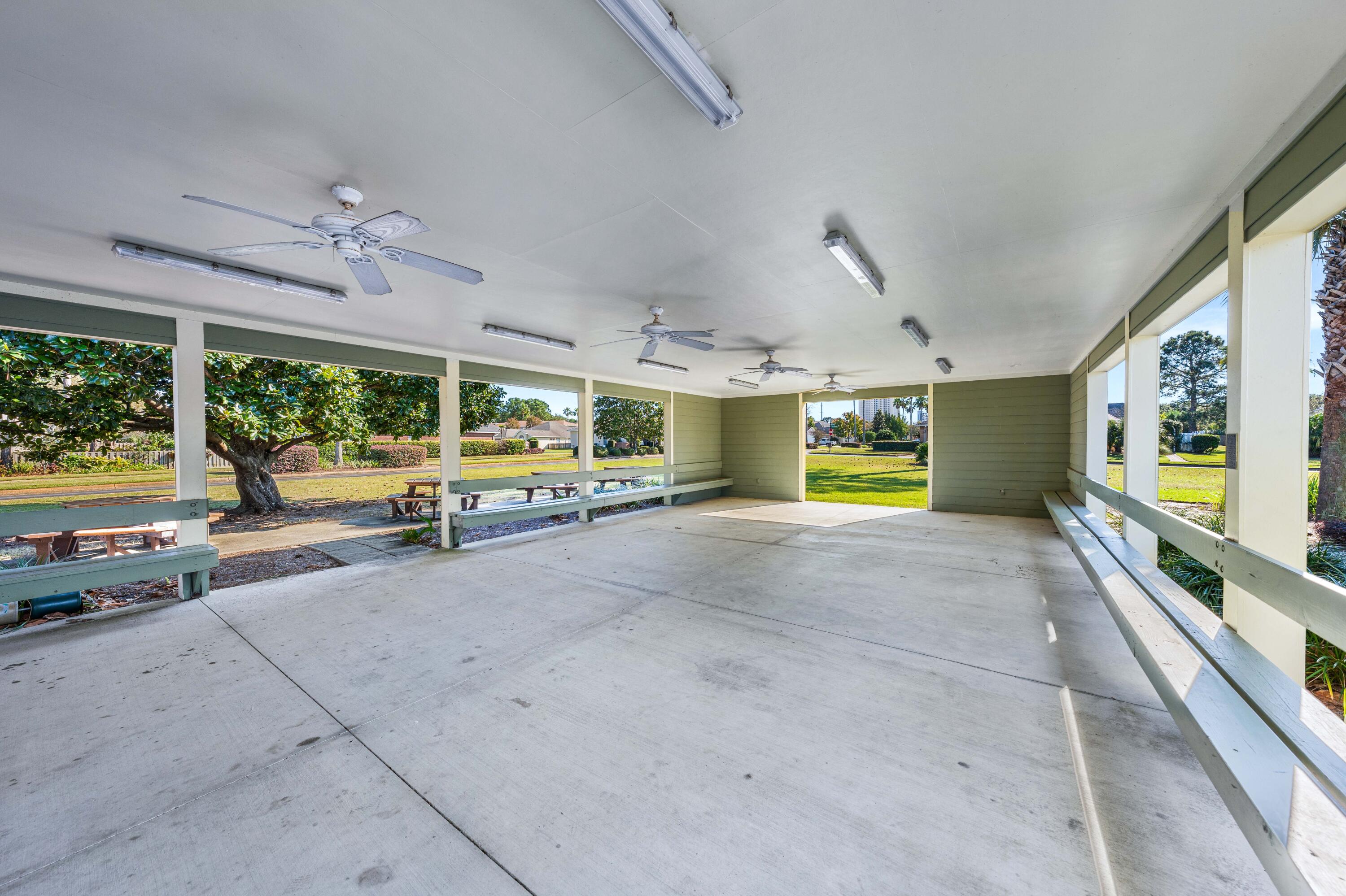 328 Bay Tree Drive Miramar Beach, FL 32550 - Photo 45 of 49 a view of a porch with furniture and a yard