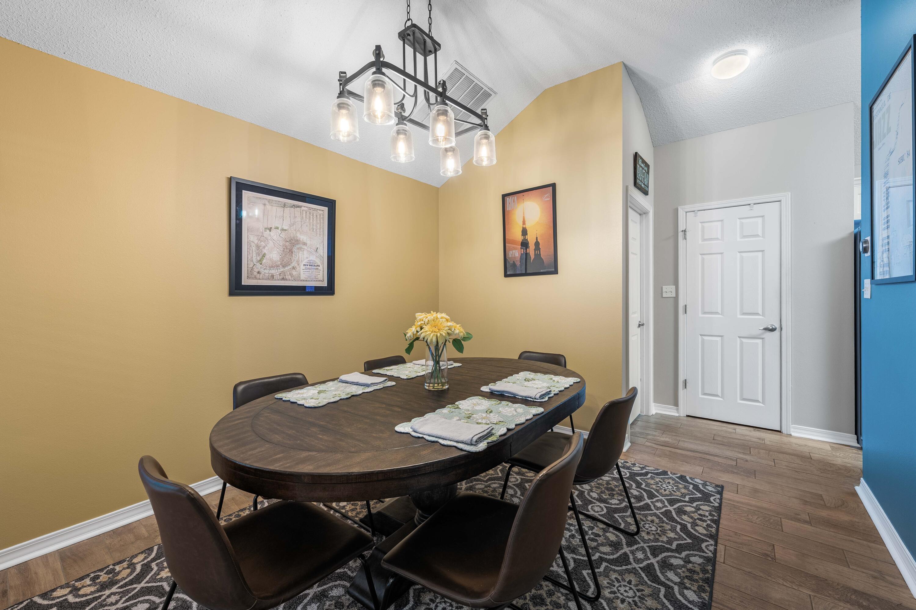 328 Bay Tree Drive Miramar Beach, FL 32550 - Photo 9 of 49 a view of a dining room with furniture and wooden floor