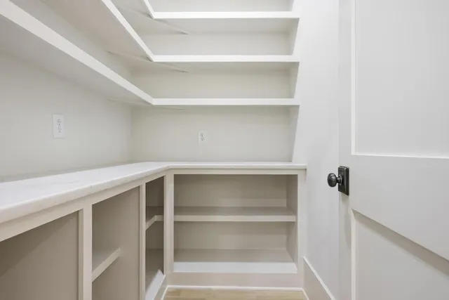 a view of an empty walk in closet