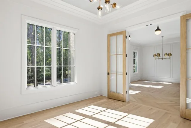 a view of empty room with windows