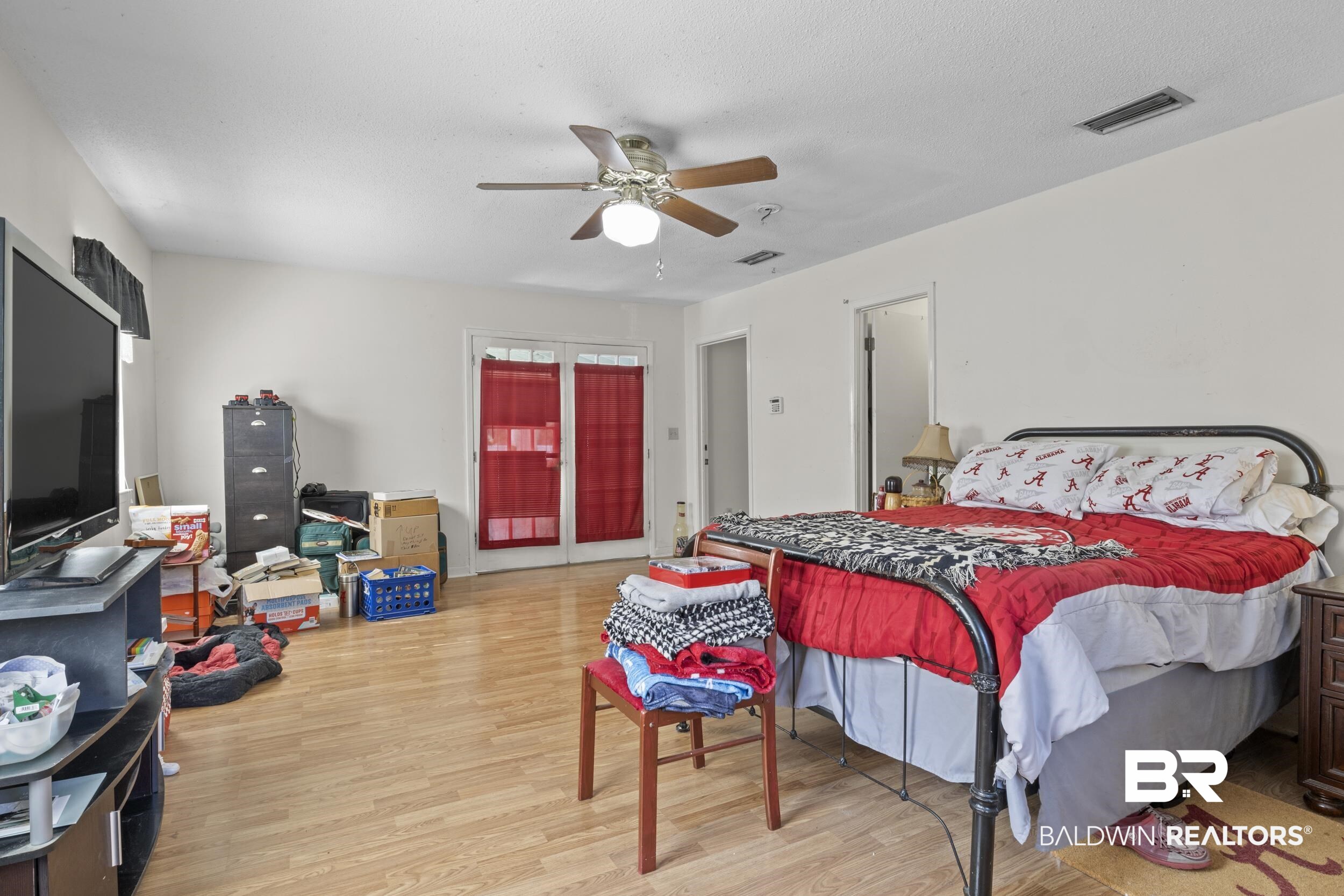 8701 A Rosemary Road Eight Mile, AL 36613 - Photo 17 of 27 Bedroom with light hardwood / wood-style flooring and ceiling fan