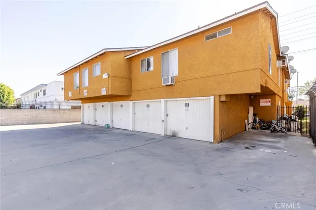 a view of a house with a street