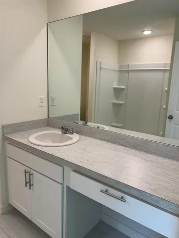 a view of a room with racks on the wall