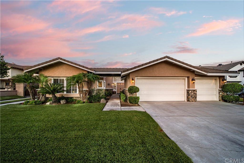 5915 San Sevaine Road Rancho Cucamonga, CA 91739 - Photo 1 of 1 a view of a house with a yard and porch