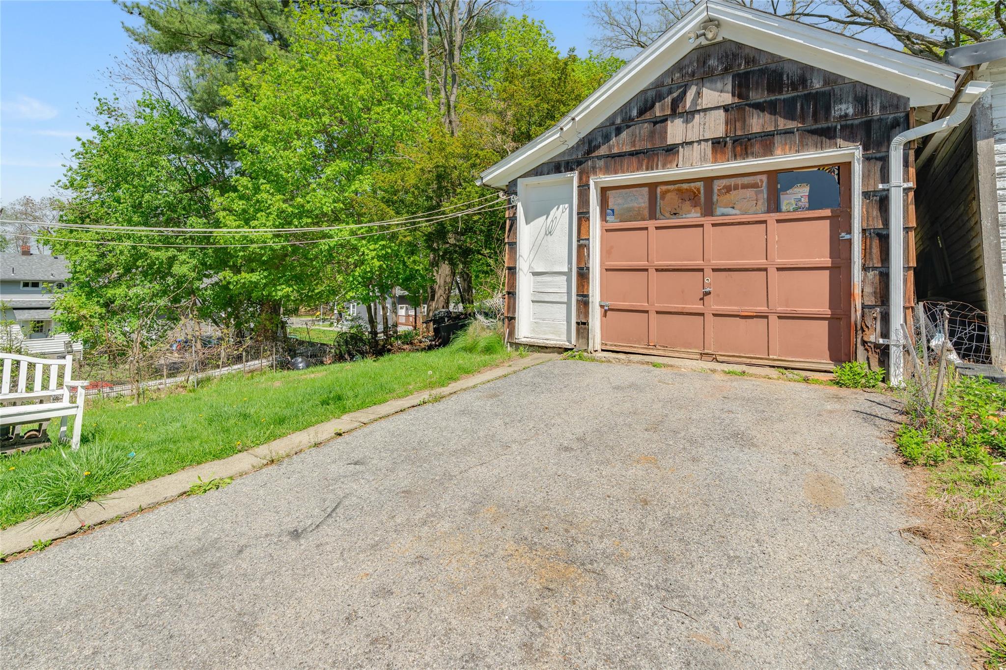 17 Lawrence Road Poughkeepsie, NY 12601 - Photo 15 of 17 Detached garage featuring aphalt driveway
