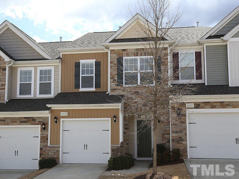 2405 Swans Rest Way, Unit 86 Raleigh, NC 27606 - Photo 1 of 12 a front view of a house with a garage