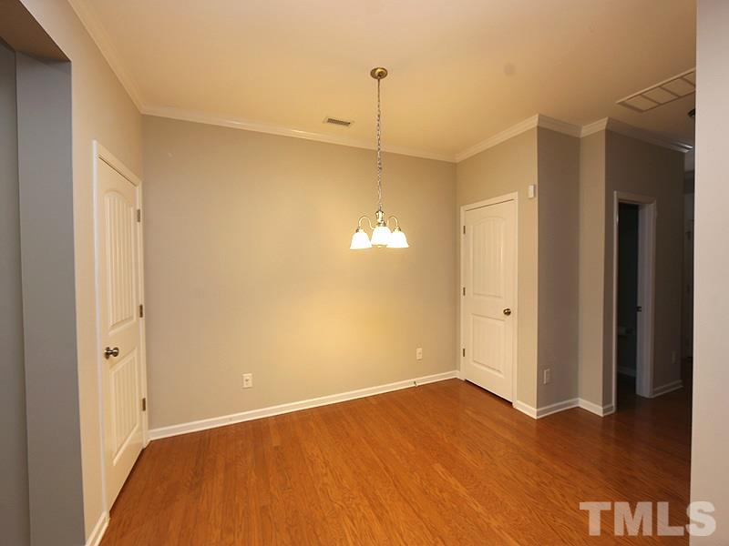 2405 Swans Rest Way, Unit 86 Raleigh, NC 27606 - Photo 2 of 12 a view of an empty room and window