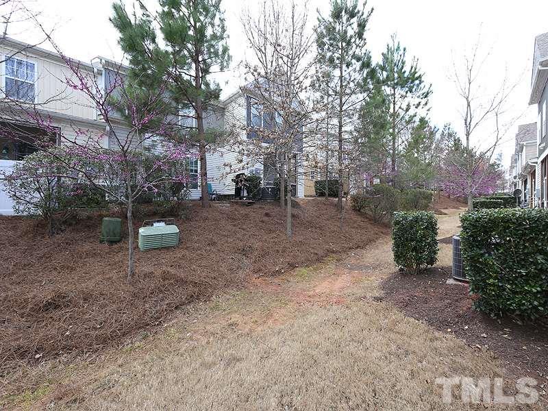 2405 Swans Rest Way, Unit 86 Raleigh, NC 27606 - Photo 11 of 12 a view of a forest with trees