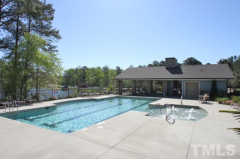 2405 Swans Rest Way, Unit 86 Raleigh, NC 27606 - Photo 9 of 12 a view of a house with swimming pool and sitting area