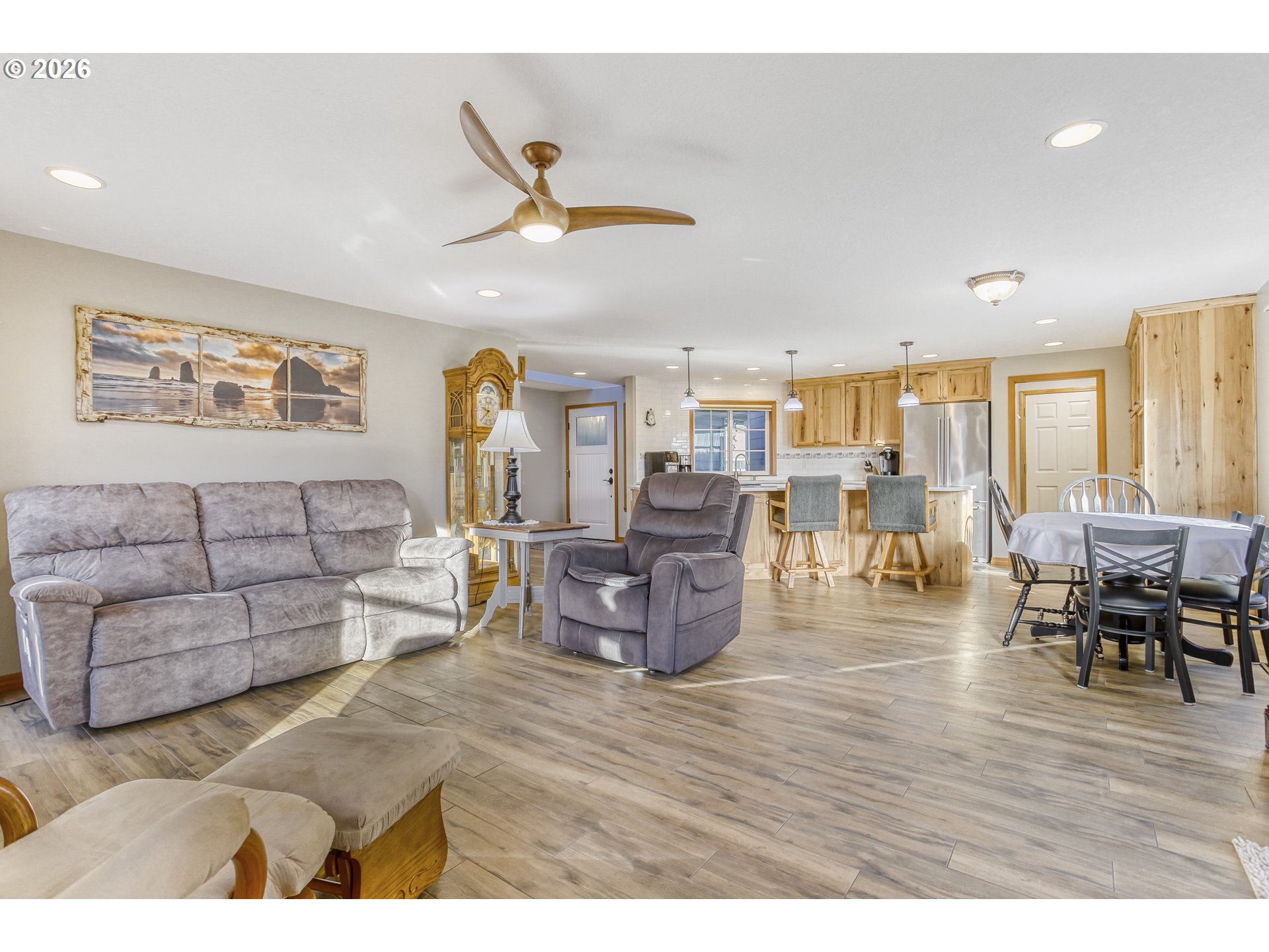 357 Southeast 7th Avenue Canby, OR 97013 - Photo 13 of 29 a living room with furniture and a large window