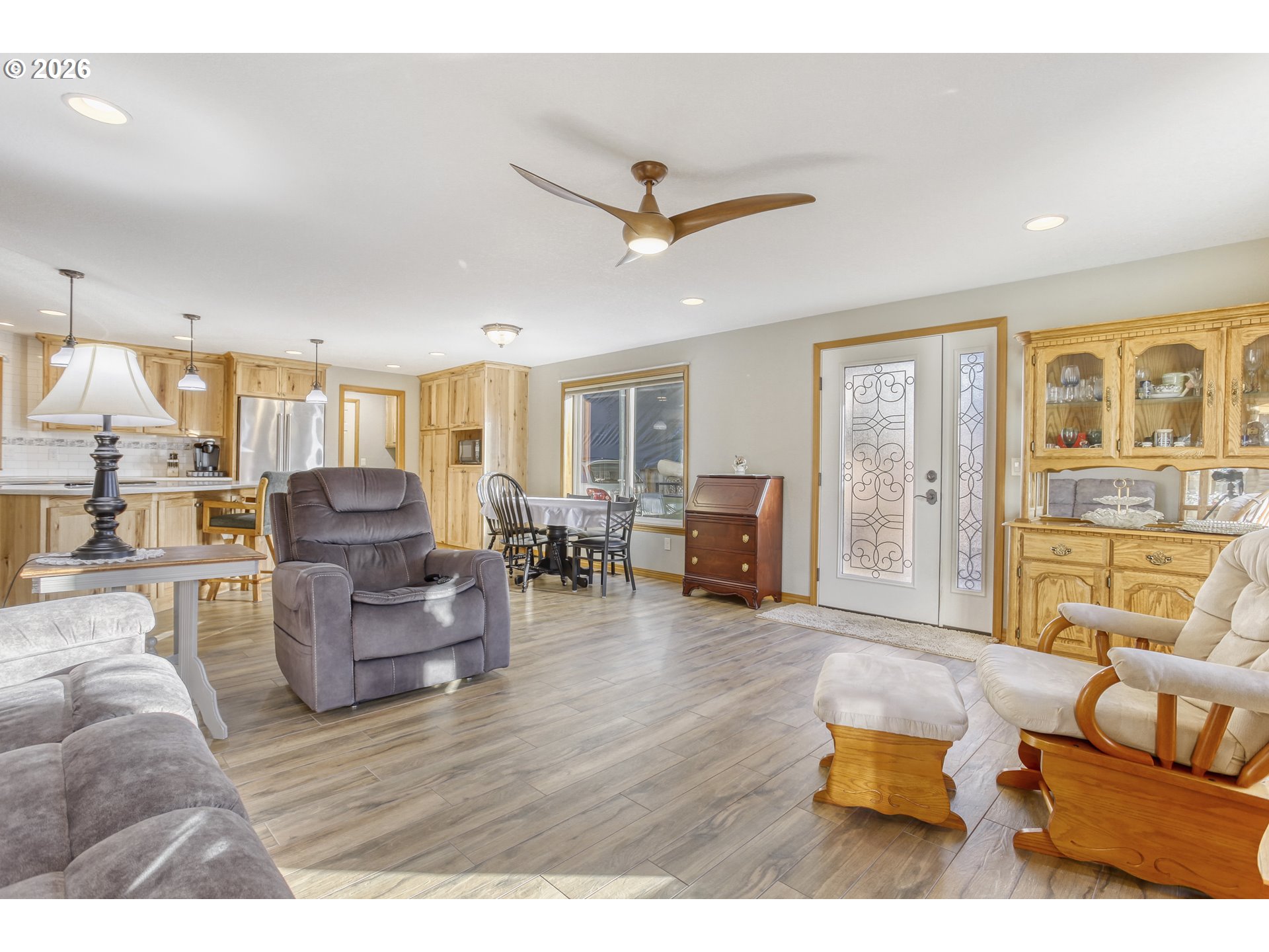 357 Southeast 7th Avenue Canby, OR 97013 - Photo 14 of 29 a living room with furniture and a large window