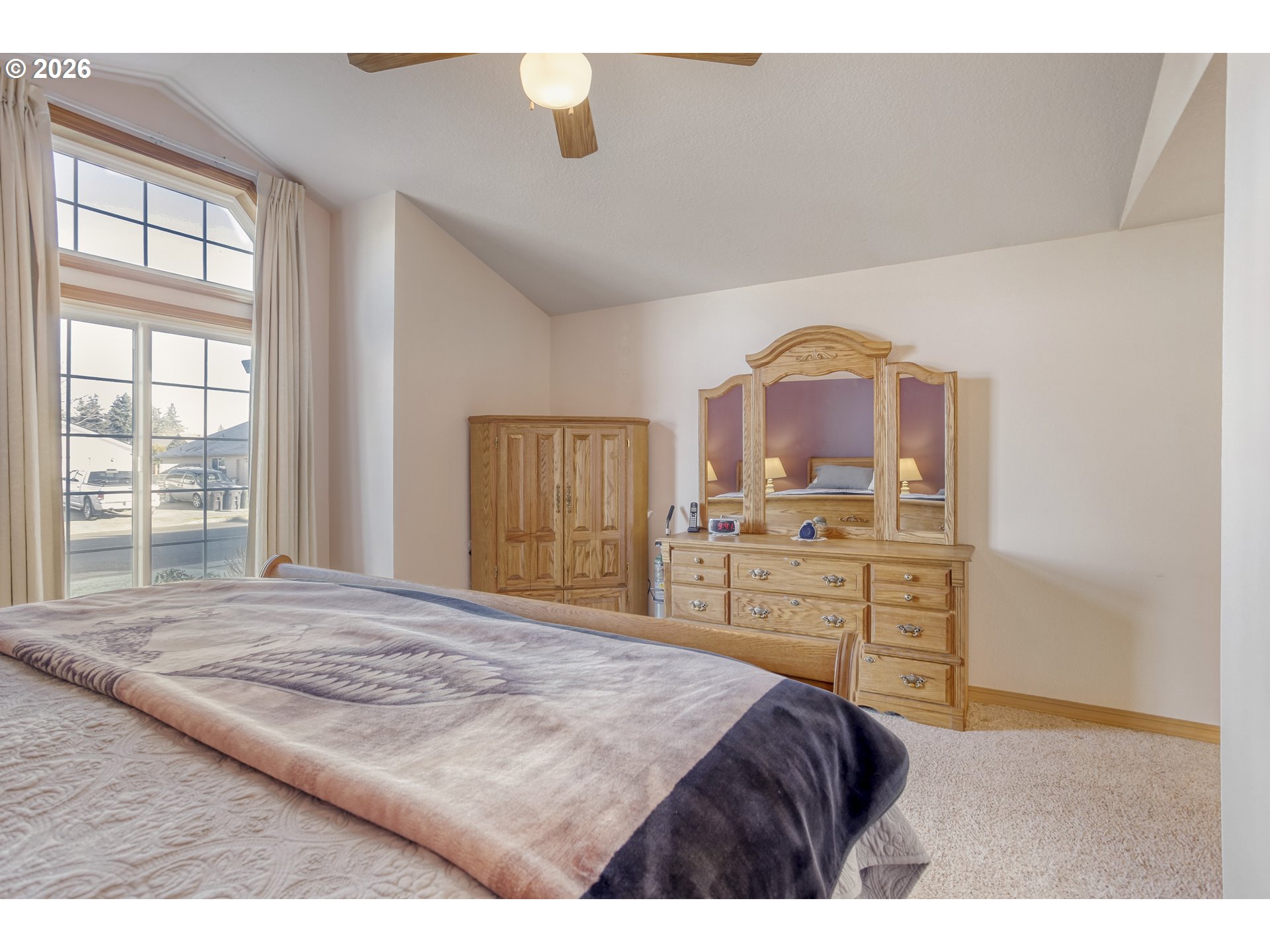 357 Southeast 7th Avenue Canby, OR 97013 - Photo 16 of 29 a bedroom with a bed and a dresser