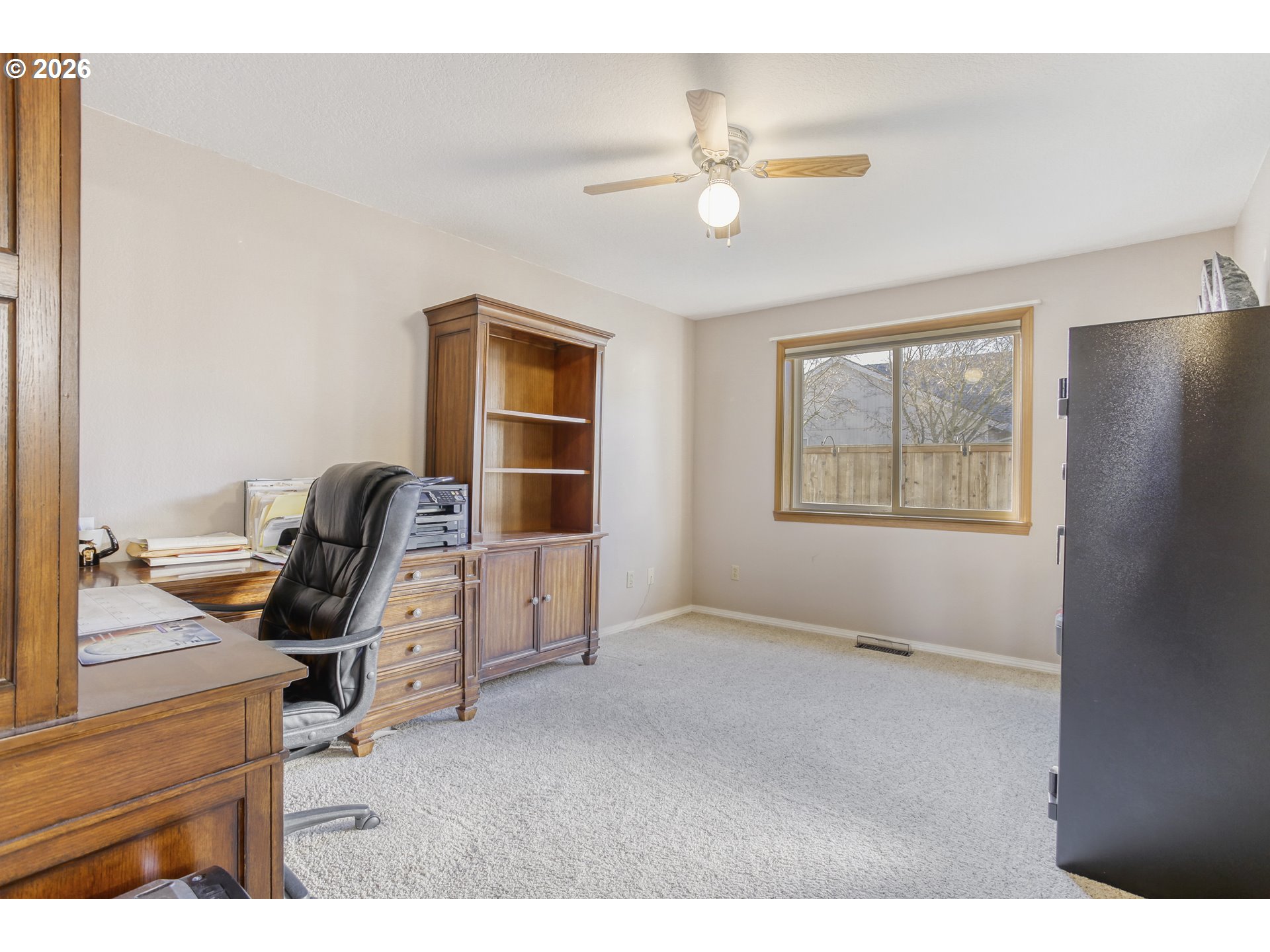 357 Southeast 7th Avenue Canby, OR 97013 - Photo 21 of 29 a view of a workspace with furniture and a window
