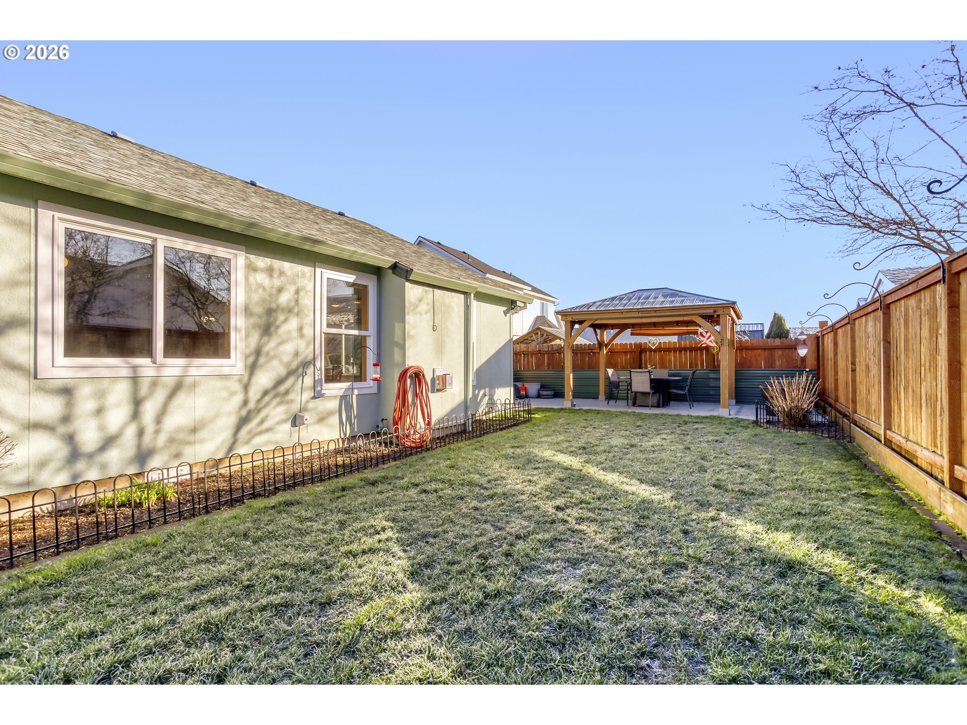 357 Southeast 7th Avenue Canby, OR 97013 - Photo 28 of 29 a view of a house with a backyard