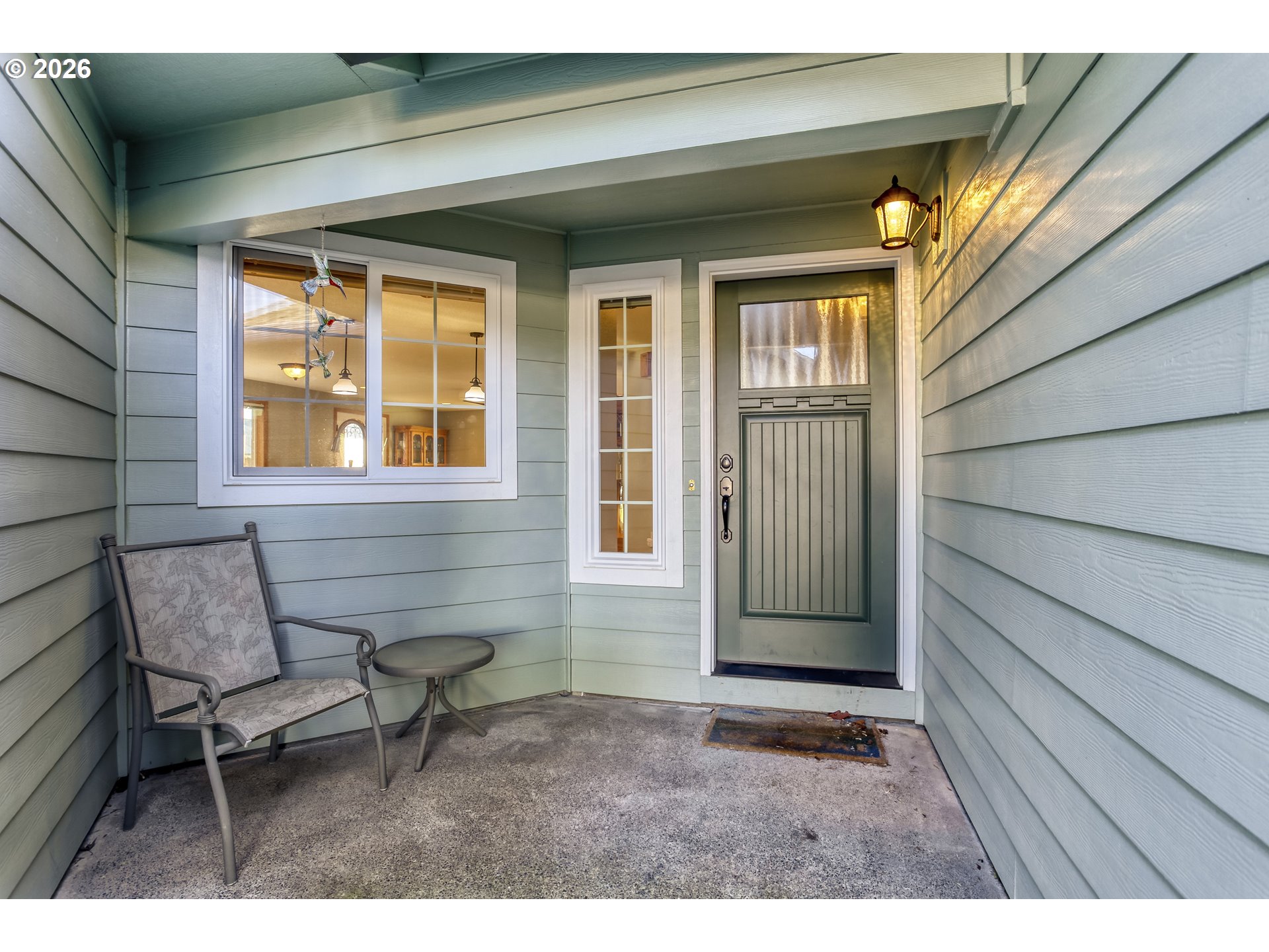 357 Southeast 7th Avenue Canby, OR 97013 - Photo 5 of 29 a house that has a wooden bench in it