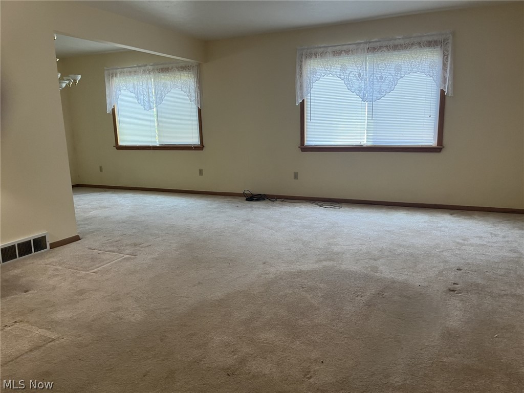 8785 Root Road North Ridgeville, OH 44039 - Photo 3 of 22 Main LR with DR around the corner-store LR and DR