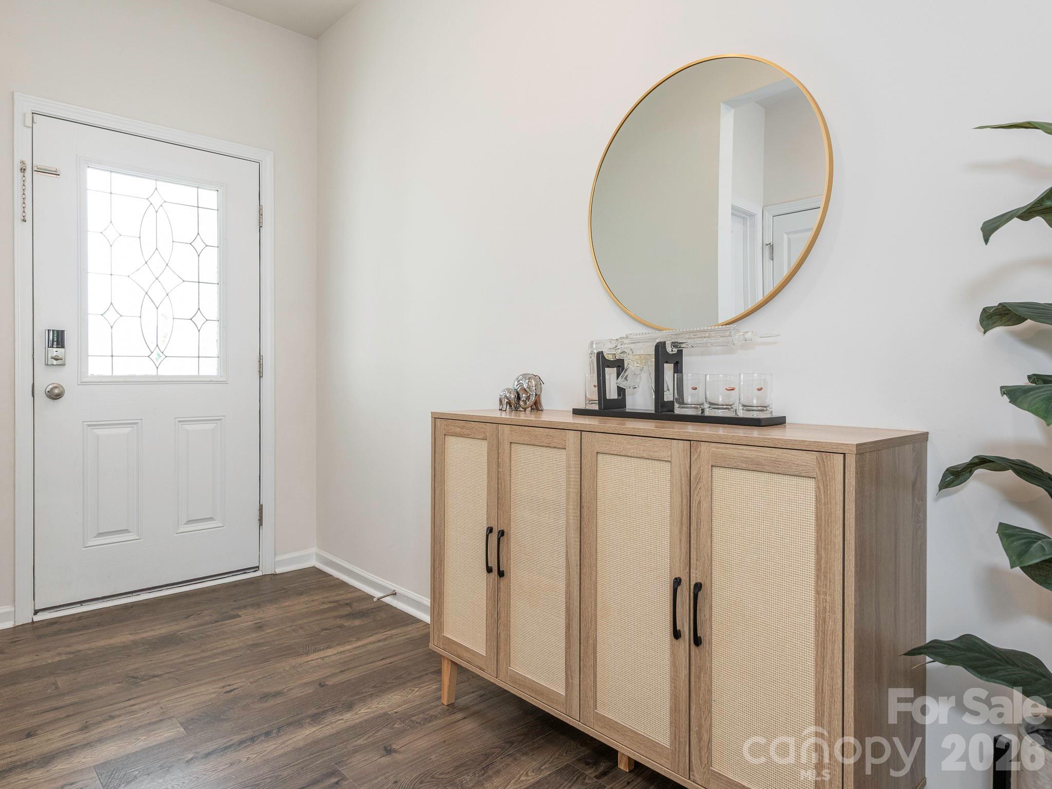 3649 Azalea Rdg Drive Mount Holly, NC 28120 - Photo 4 of 37 an entryway with wooden floor and mirror