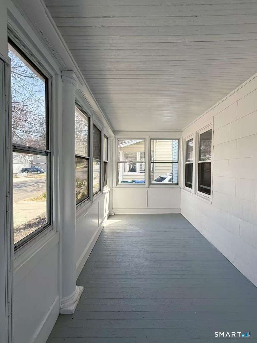 24 Paramount Avenue Hamden, CT 06517 - Photo 3 of 25 a view of an empty room with a window