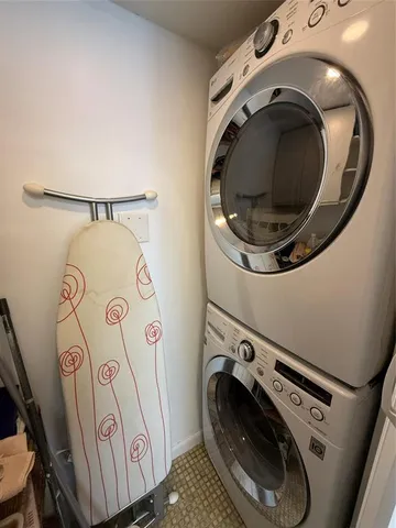 a bathroom with a mirror and a shower