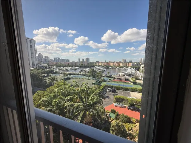 a very nice looking dining room with a dining table chairs with wooden floor