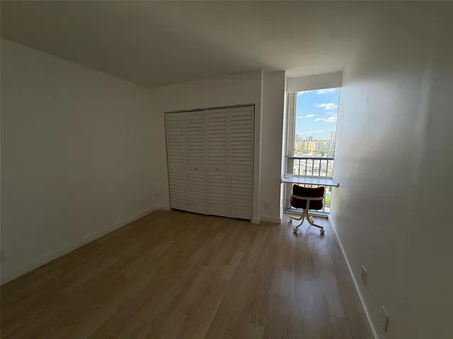 a view of swimming pool from a balcony
