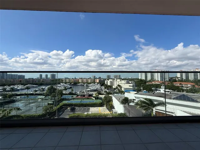 a view of a swimming pool with a lounge chairs