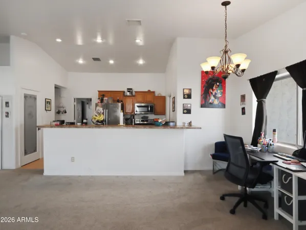 a living room with furniture and a table