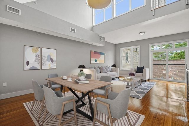 a living room with furniture and a gate