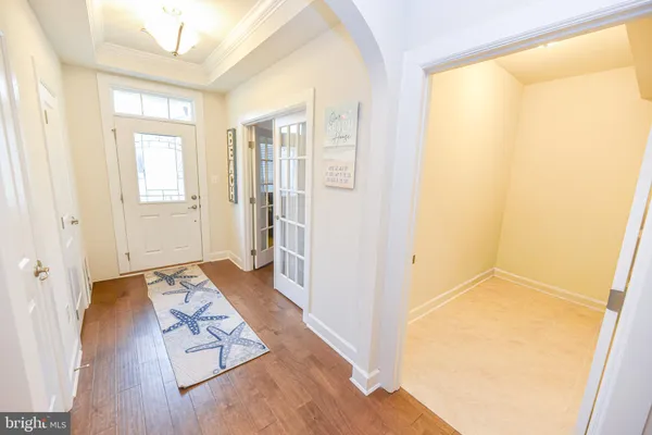 a view of livingroom with hardwood floor and hallway