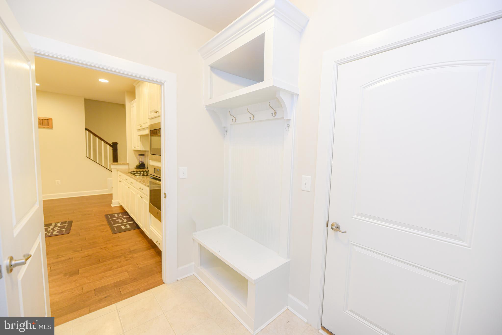 22379 Grebe Lane Ocean View, DE 19970 - Photo 14 of 41 a bathroom with a tub shower and a sink