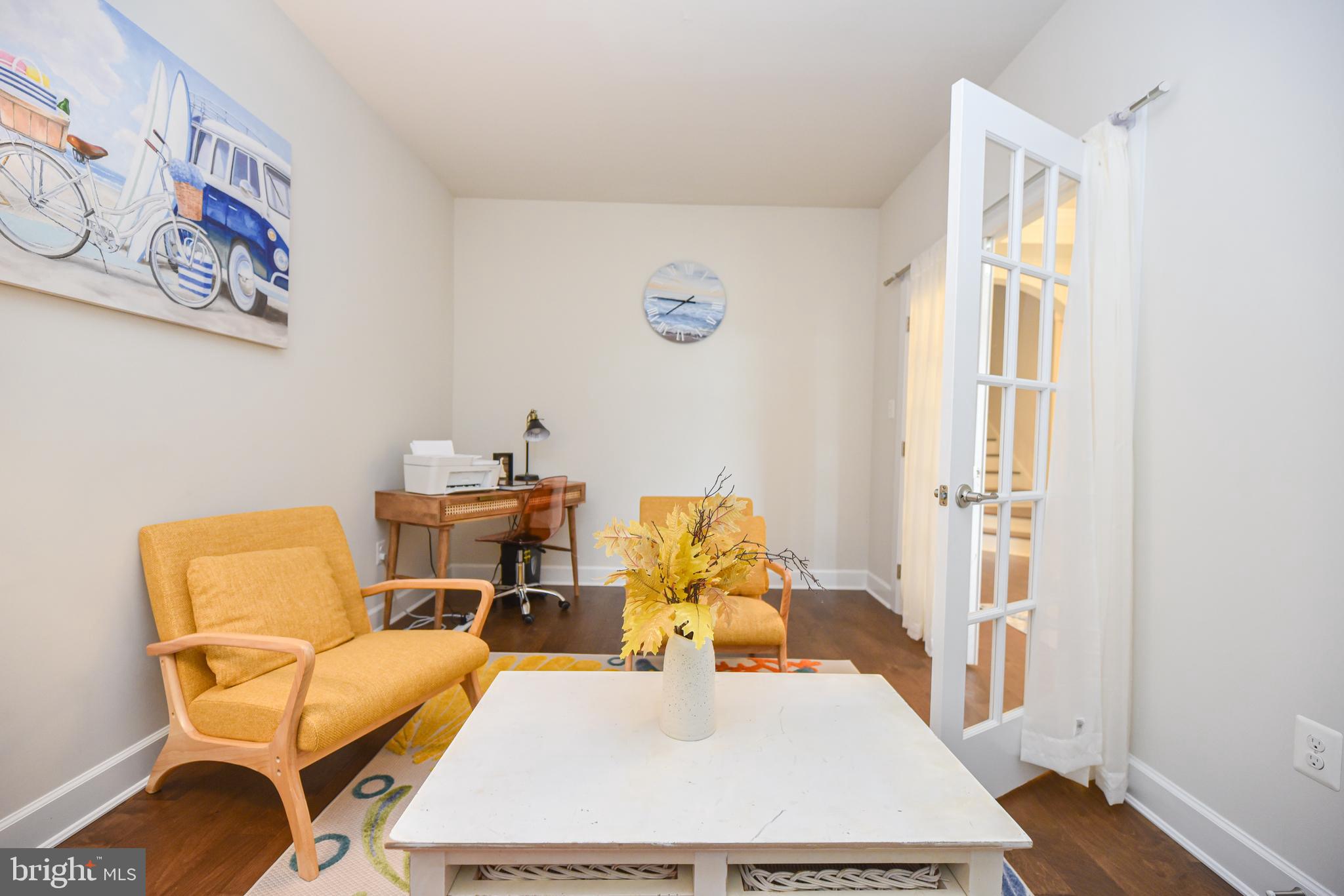 22379 Grebe Lane Ocean View, DE 19970 - Photo 16 of 41 a room with furniture and a table