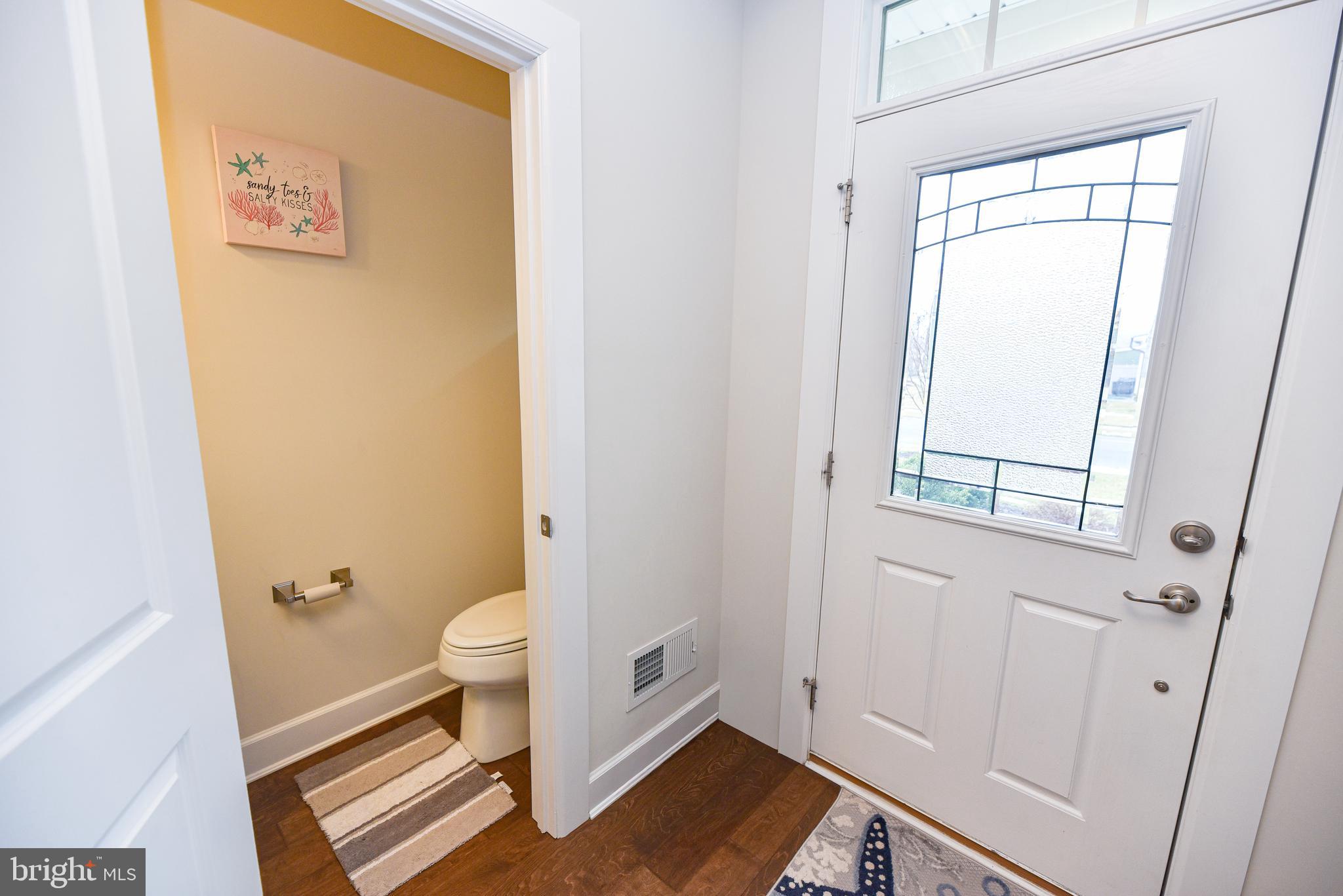 22379 Grebe Lane Ocean View, DE 19970 - Photo 18 of 41 a bathroom with a toilet and a shower
