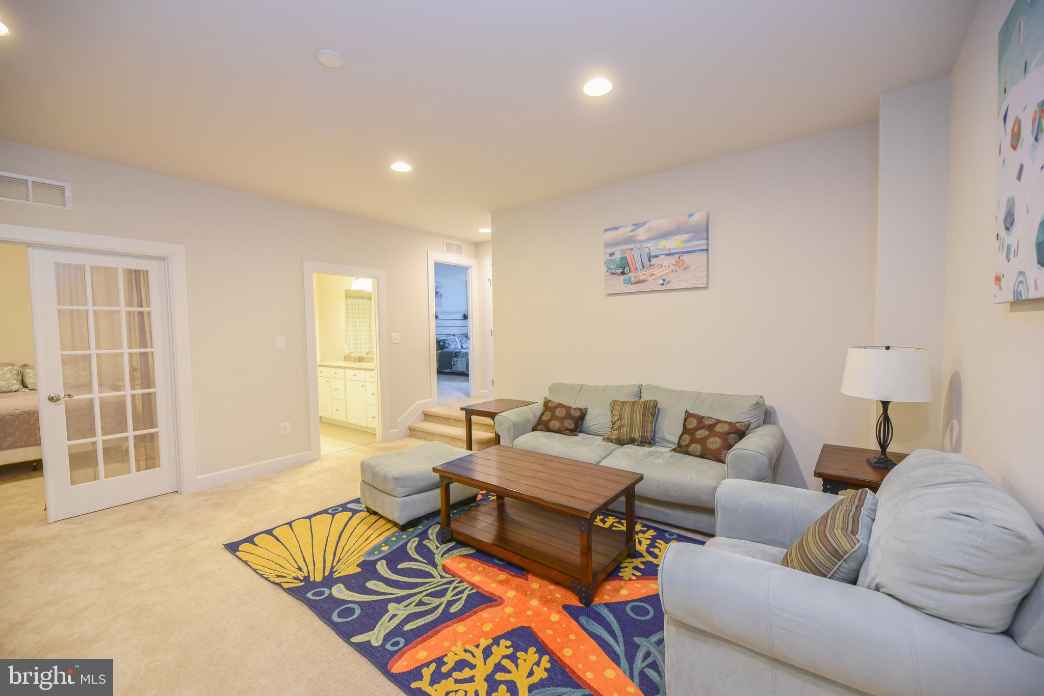 22379 Grebe Lane Ocean View, DE 19970 - Photo 25 of 41 a living room with furniture and a window