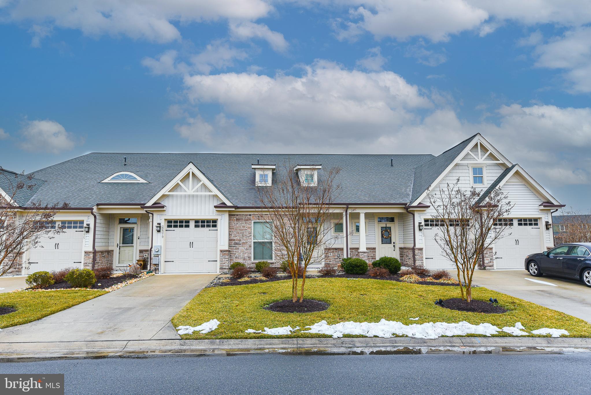 22379 Grebe Lane Ocean View, DE 19970 - Photo 3 of 41 a front view of a house with a yard and garage