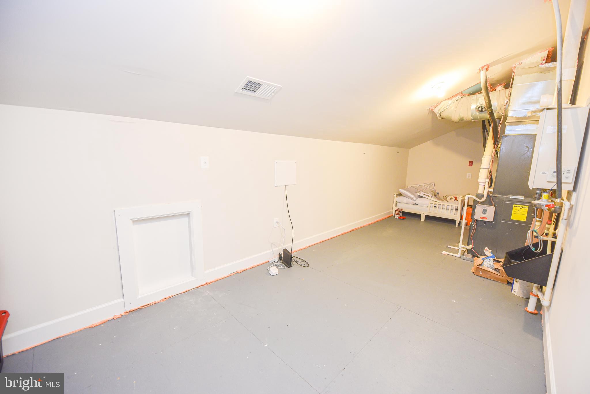 22379 Grebe Lane Ocean View, DE 19970 - Photo 37 of 41 a view of a room with rack on the wall