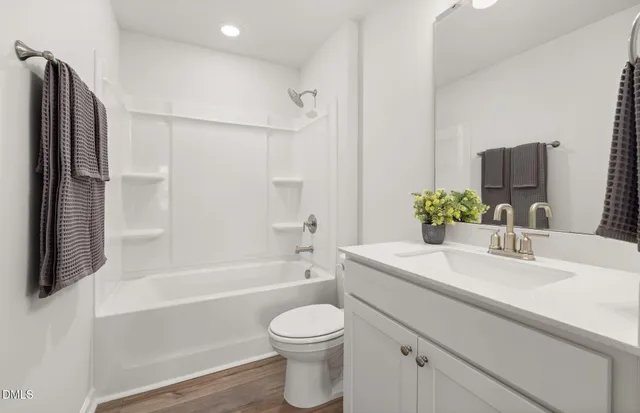 a bed room with a bed and a window