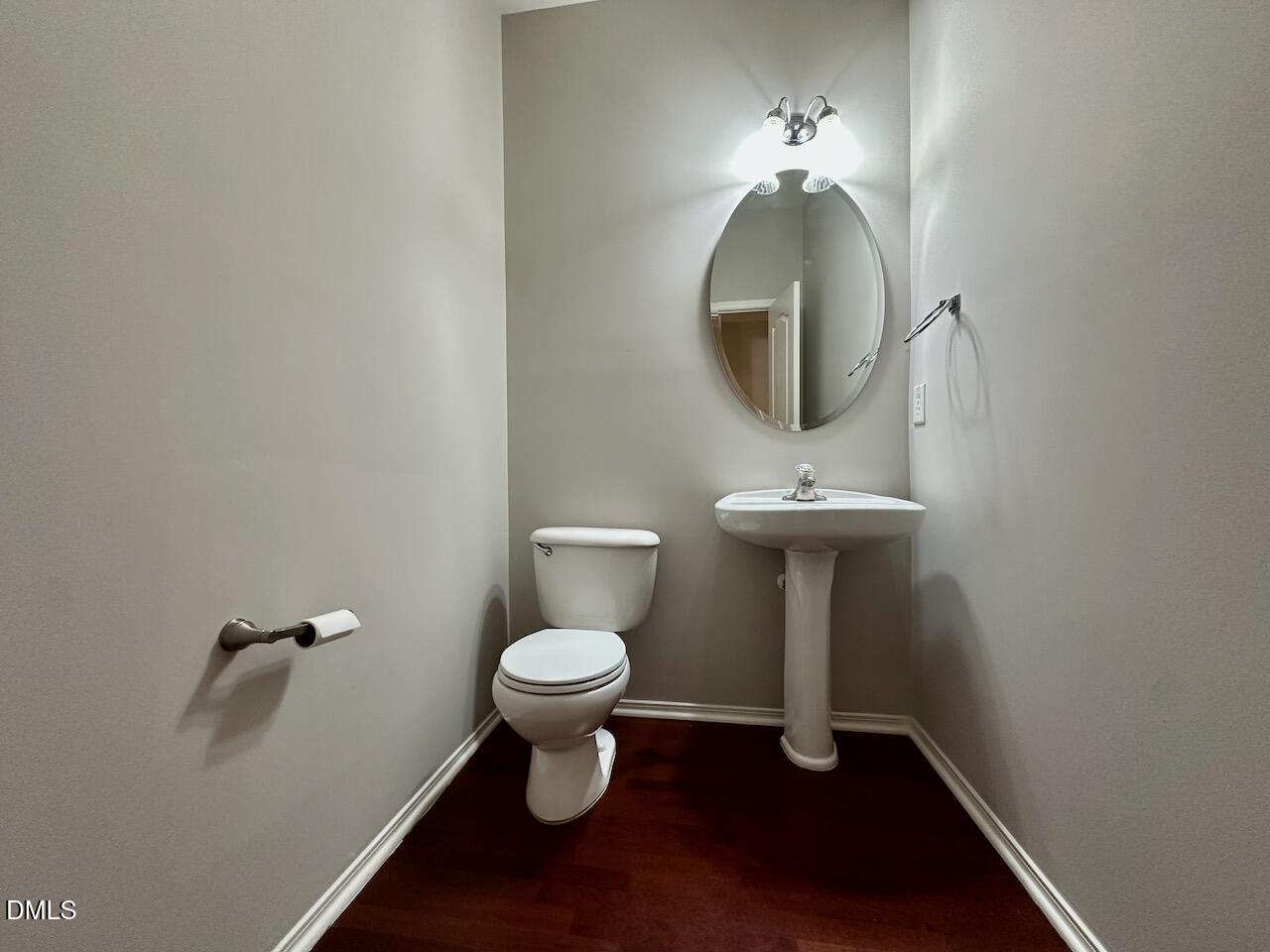 8208 Stone Cellar Drive Raleigh, NC 27613 - Photo 17 of 34 a bathroom with a sink toilet and a mirror