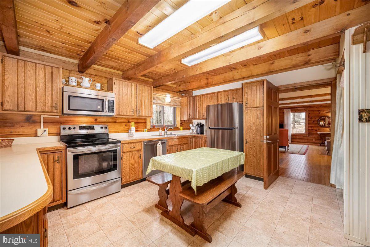 2324 Carrollton Road Westminster, MD 21157 - Photo 13 of 66 a kitchen with a refrigerator and a sink