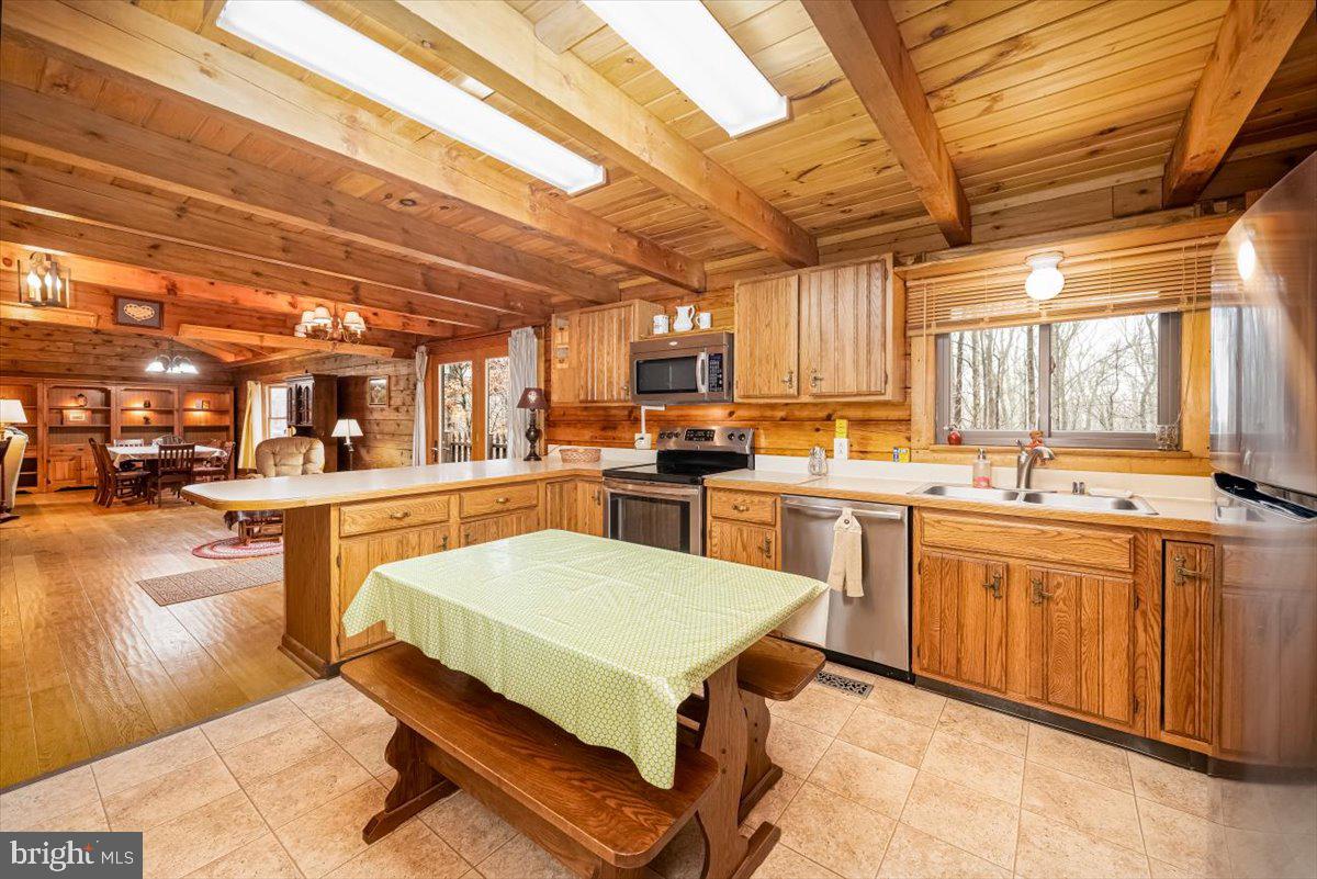 2324 Carrollton Road Westminster, MD 21157 - Photo 14 of 66 a kitchen with a sink appliances and cabinets