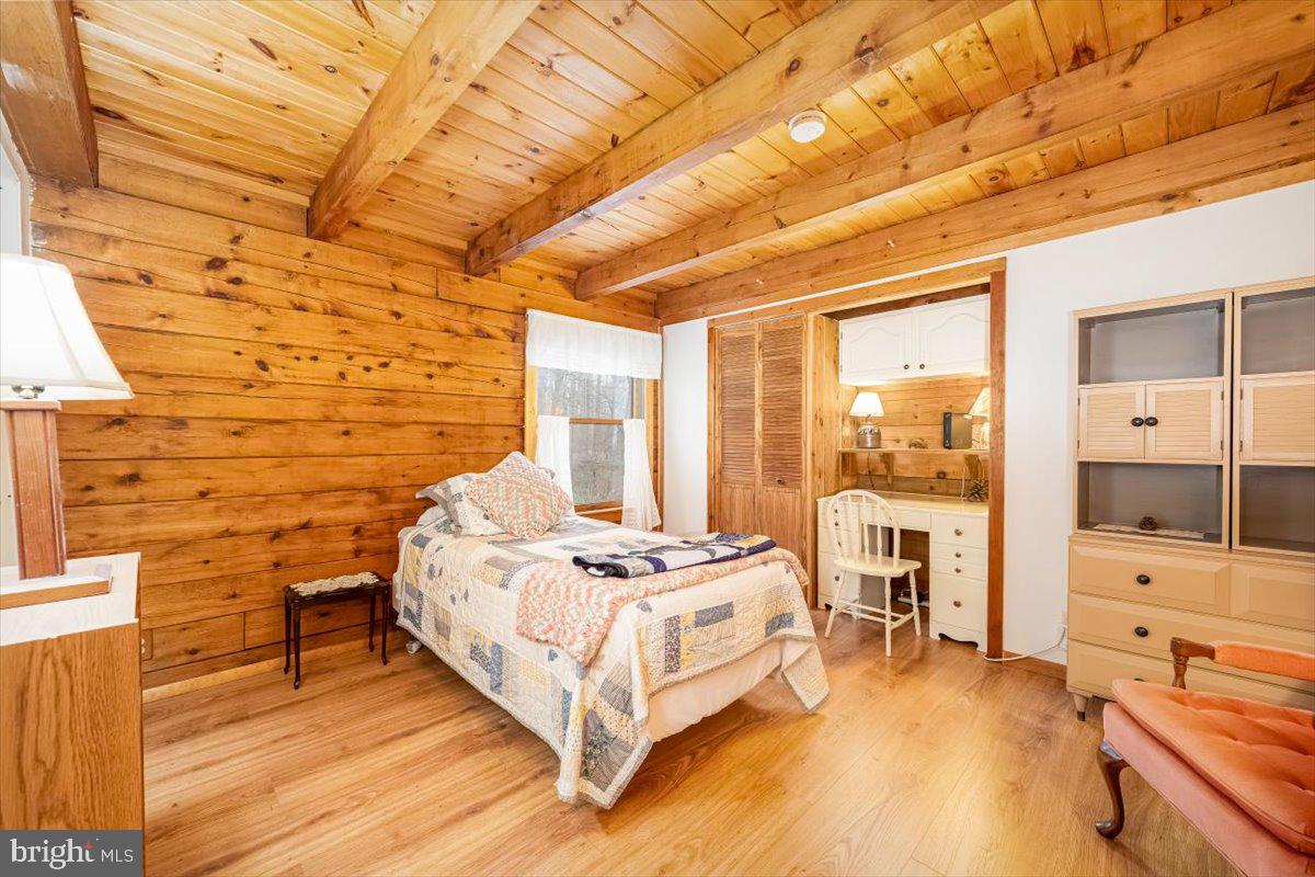 2324 Carrollton Road Westminster, MD 21157 - Photo 19 of 66 a spacious bedroom with a bed and a table