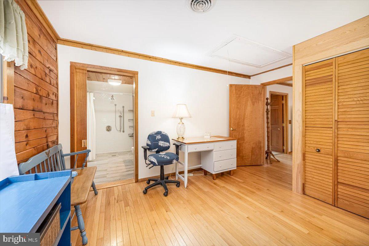 2324 Carrollton Road Westminster, MD 21157 - Photo 22 of 66 a view of a workspace with furniture and a window