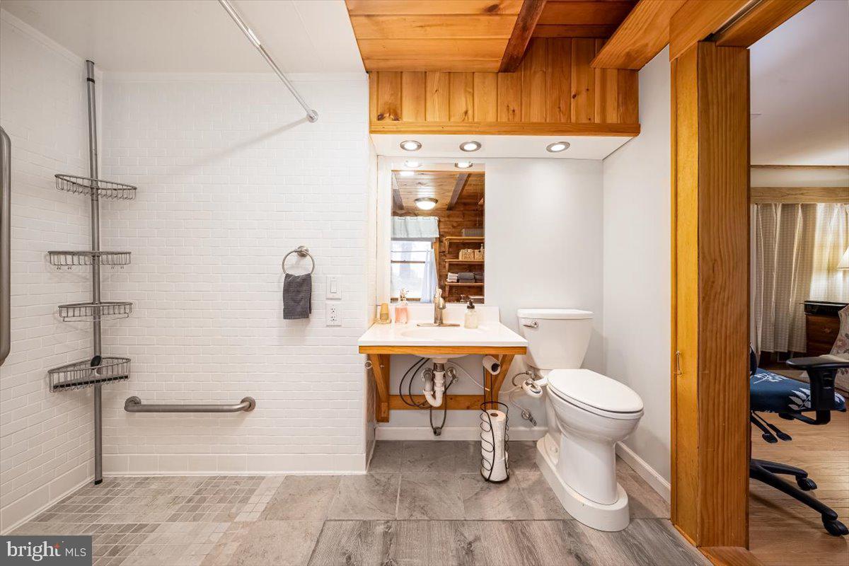 2324 Carrollton Road Westminster, MD 21157 - Photo 25 of 66 a bathroom with a toilet a sink and a shower
