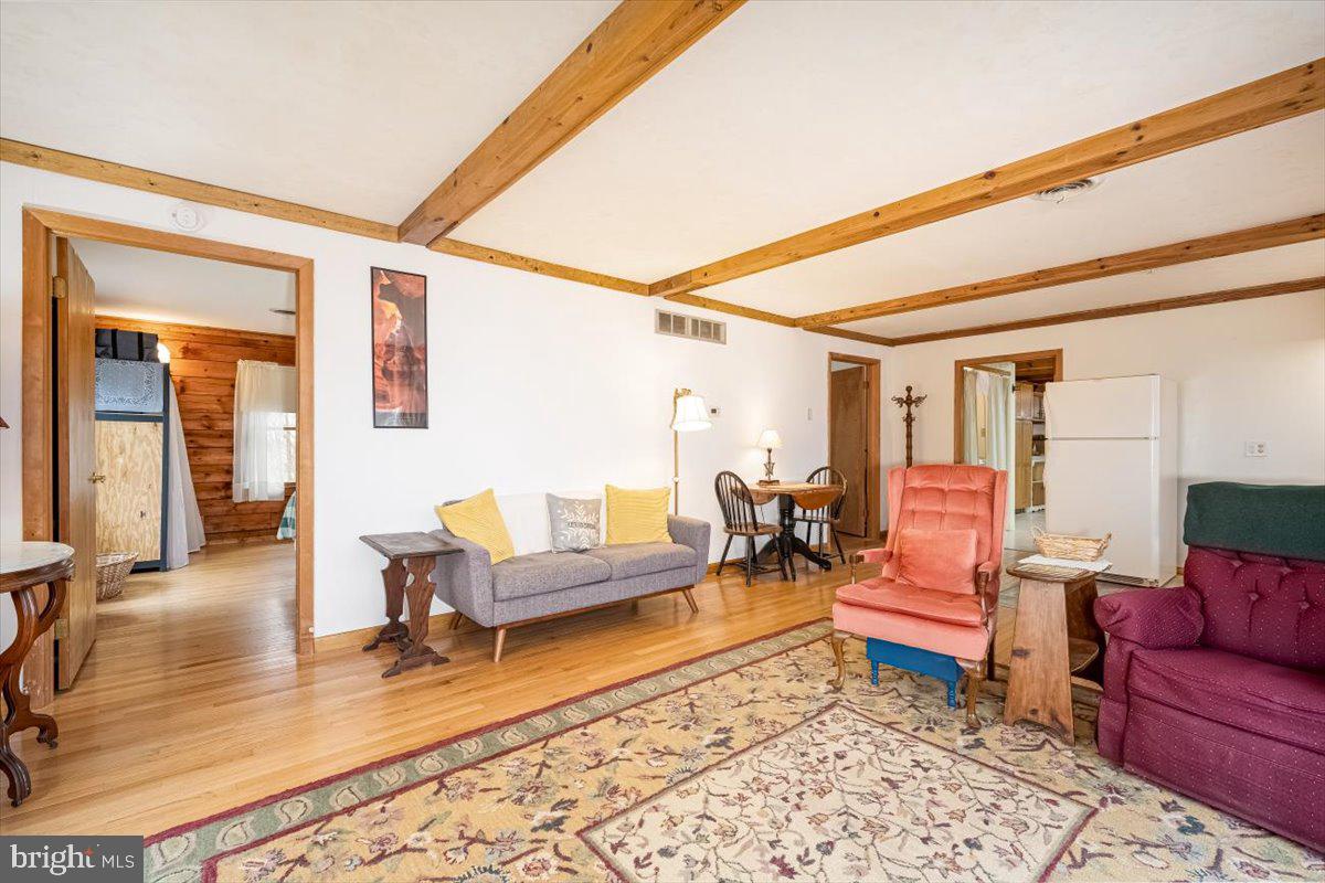 2324 Carrollton Road Westminster, MD 21157 - Photo 33 of 66 a living room with furniture and a rug
